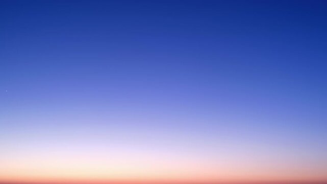 Night sky gradient transition from dark blue to twilight horizon, time lapse. Atmospheric background featuring star light and dusk glow. Evening sky stage for cosmic texture and celestial design.