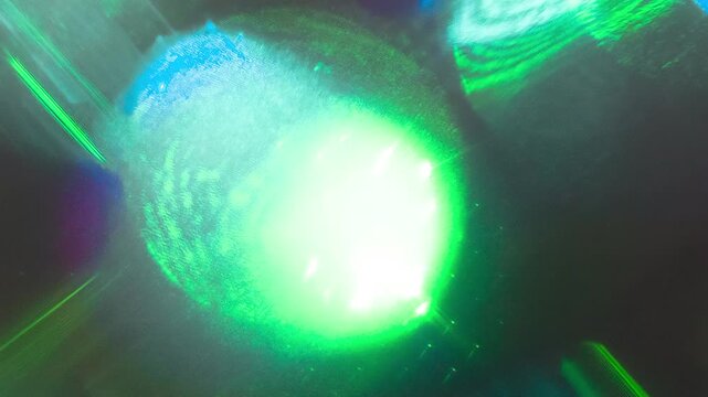 Laser Light for Sci-Fi Backgrounds. Chaotic flickering and flashing of geometric shapes as a visualization of physical processes in scientific experiments and research at the atomic level