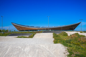 Naklejka premium London, UK - 21 September, 2025 - Lee Valley Velopark, a cycling centre on Queen Elizabeth Olympic Park, including a velodrome and BMX racing track (bicycle motocross)
