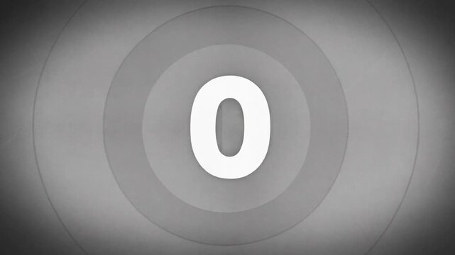 Vintage black and white countdown from five to zero with a flickering effect, replicating the look of an old fashioned film leader for cinema projection and movie intros