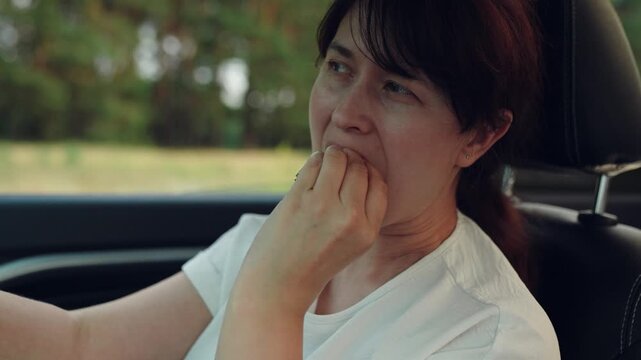 woman girl eating burger car, happy person, Road trip meal ideas, Female driver eating sandwich, Snack break inspiration, Realistic driving scenario, Balancing food and steering, Woman on journey