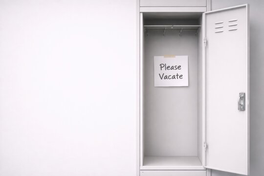 Empty locker with notice to vacate in minimalistic storage space