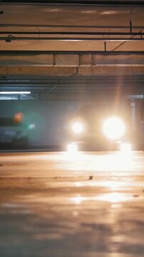 Man freerunner doing side flips in the garage, parkour acrobatic elements