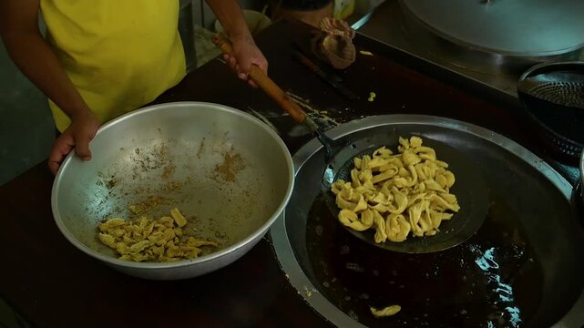 Fafda a crispy Gujarati snack made from gram flour and often served with chutney