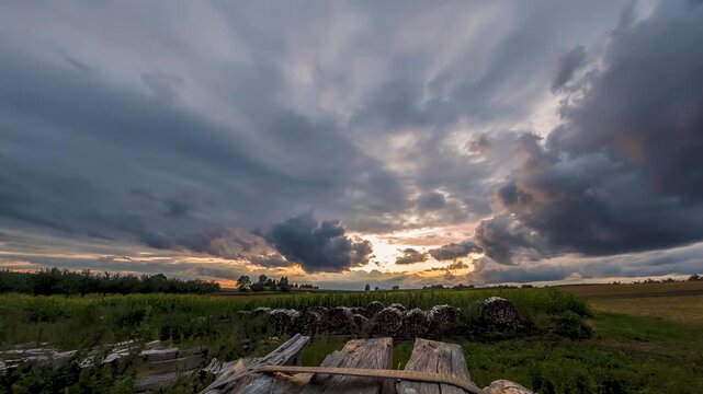 A panoramic view of a sky with storm clouds forming in a time-lapse sequence in nature.