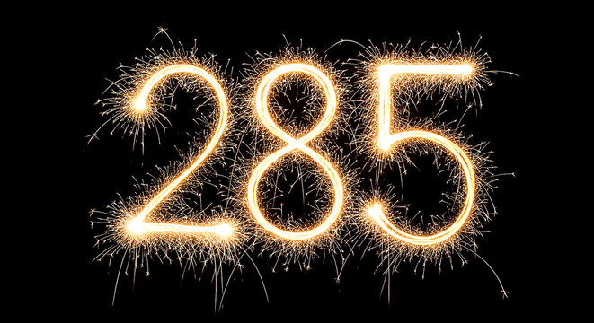 Vibrant fireworks forming the number 285, glowing brightly against a dark backdrop for a dynamic visual effect.