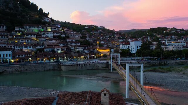 Time lapse of Berat, Albania during a sunset. It goes from the late evening to night with illumination being turned on, zoom in