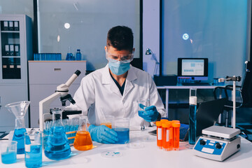 Fototapeta premium Lab technician experimenting in lab