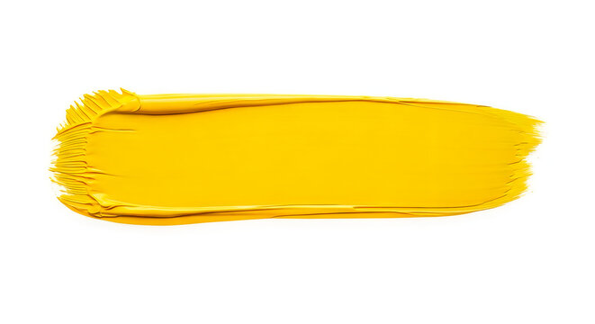 Vibrant yellow acrylic paint brush stroke with thick texture and visible bristles captured in high resolution on white background