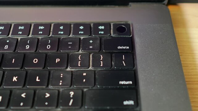 Biometric fingerprint scanner sensor laptop keyboard securely logging in unlocking authenticating passwordless data protection identity verification