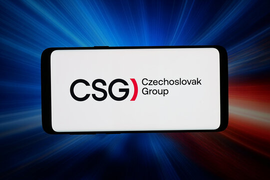 Stuttgart, Germany - 06-02-2026: In this photo illustration, the logo of holding company Czechoslovak Group a.s. (CSG) is displayed on a smartphone in front of abstract background on computer screen.