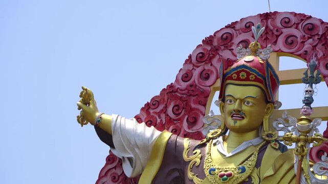 Close up planning shot showing the great statue of Guru Padmasmabhava, Guru Dregpa Kundul the tamer showing Rinpoche in wrathful form at Mindrolling Monastery Dehradun
