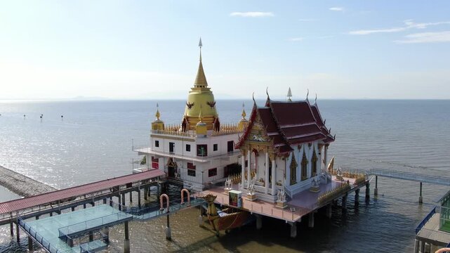 Aerial view of Wat Hong Thong, a beautiful Buddhist temple built on the sea coast in Chachoengsao province, Thailand.