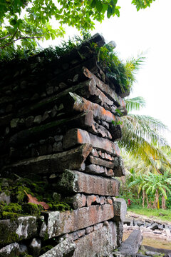 Nan Madol archaeological site tall basalt and coral boulder walls at entrance of Pohnpei, Federated States of Micronesia