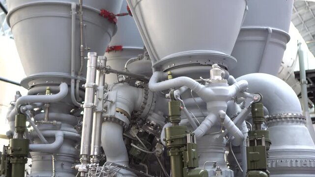 Footage of a Soviet rocket engine showcasing advanced aerospace engineering and space technology. Massive propulsion hardware with metallic textures and industrial details representing the legacy of
