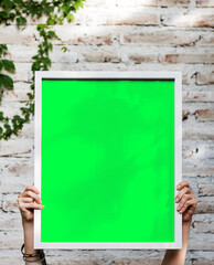 Vibrant green poster frame outdoors, suitable as mockup