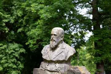 Obraz premium Historic Statue on the summer mystery old Prague Cemetery, Czech Republic 