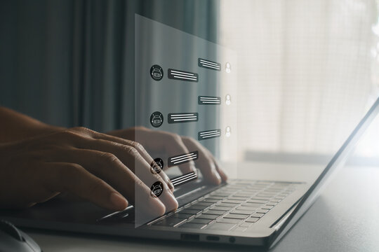 Customer support agent using laptop with virtual live chat interface, representing online assistance, instant messaging, CRM service technology, AI chatbot communication, business help desk response.