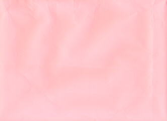 Fototapeta premium Soft pink fabric texture background for luxury cosmetic branding, beauty product presentation, and wedding invitation design