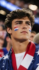 Fototapeta premium Young american soccer fan watching game, showing patriotism and support for team