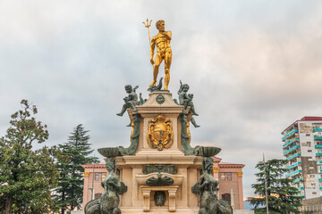 Fototapeta premium Western Asia, South Caucasus, Republic of Georgia, Adjara, Batumi. The Fountain of Neptune is an impressive landmark in Europe Square.