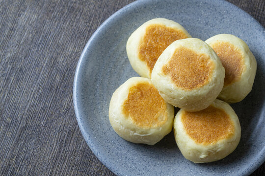 Authentic Bakpia Kacang Hijau or bakpia with mung bean filling, a popular sweet snack from Yogyakarta Indonesia on a plate