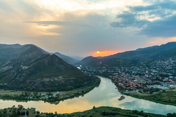 Western Asia, South Caucasus, Republic of Georgia, Mtskheta-Mtianeti. Mtskheta. Kura River at sunset. © Emily_M_Wilson