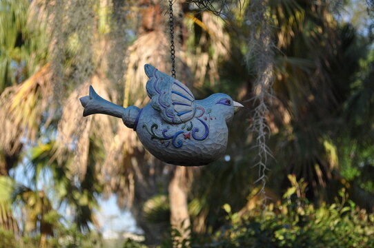 clay bird on the tree