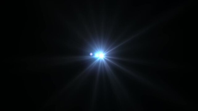Optical flare with light rays on black background alpha chenel. shine light lens flares flickering animation overlays. white light star burst, abstract glow lens flare background.4 k animation video.