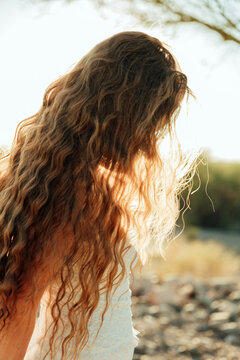profile of a girl's long hair