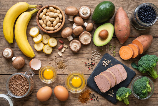 Raw foods high in biotin and vitamin b7 on wooden background