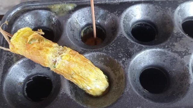 sausage with omelet on grilled