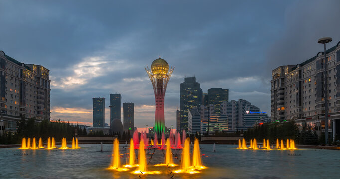 View of the central part of the capital of Kazakhstan, Astana, on a picturesque cloudy evening with the symbolic tower of Baiterek