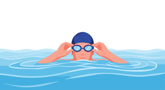 Male swimmer wearing a blue swimming cap and goggles looking forward while wading in blue rippling water waves.