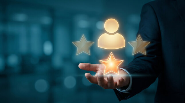 Businessman Holds Glowing User Icon With Stars to Reward Top Performers, Recognize Excellence, Highlight Talent, and Celebrate Achievement, Focusing on Customer Rating and Reputation