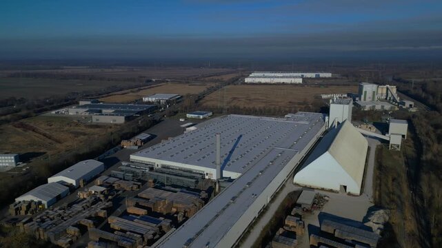 Industrial factory complex production Gipsum drywall. Amazing aerial view drone