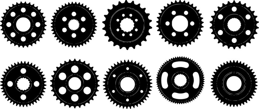 Collection of black sprocket and gear silhouettes white background, mechanical industrial