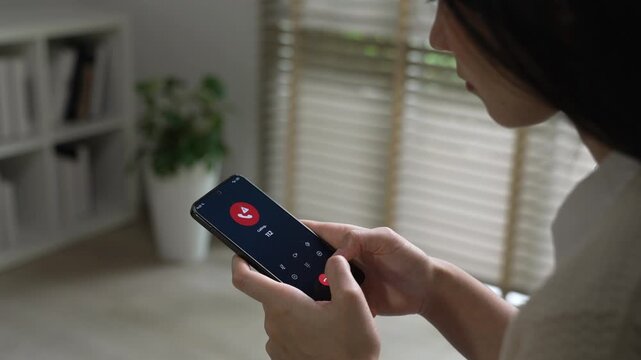 Woman calling emergency number 112 for crisis situation