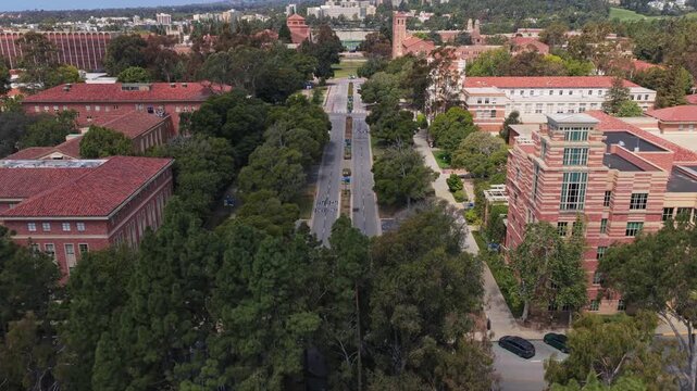 University of California, Los Angeles campus aerial pull up over Westwood Plaza revealing Janss Steps and surrounding college buildings
