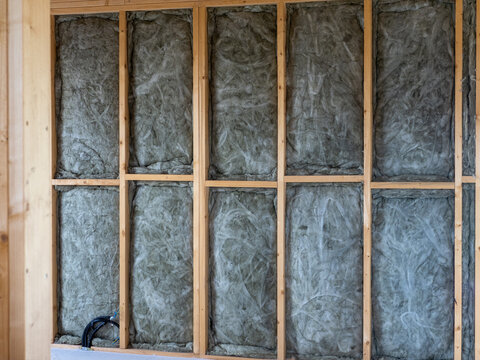Lightweight timber frame structure with rock wool insulation between the beams. Energy-efficient new build house