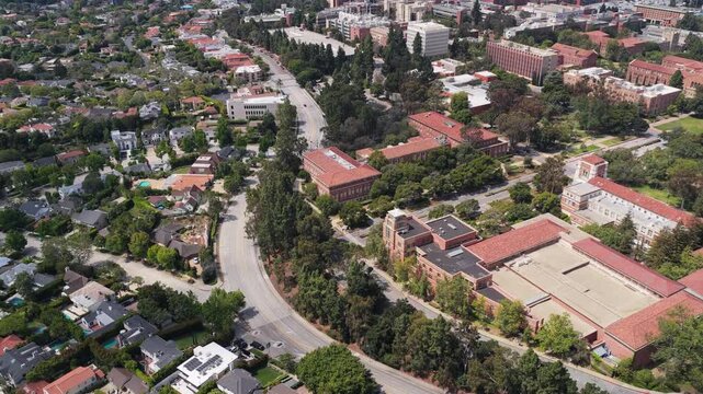 University of California Los Angeles campus and residential Westwood neighborhood buildings, landscape, and street showing urban planning and infrastructure in California