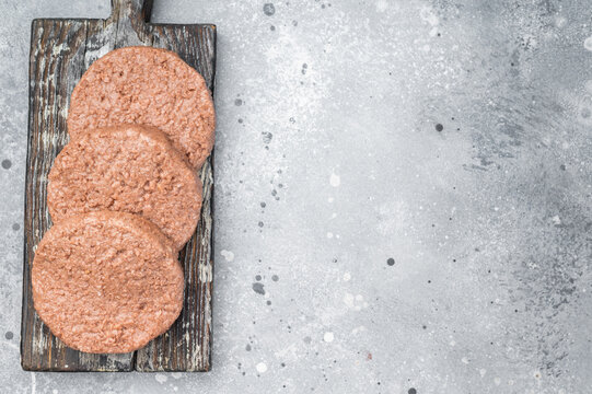 Vegetarian plant based burger patties meat substitute high protein cruelty free food clean top view background