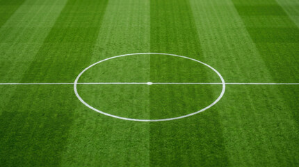 Obraz premium Football field center circle on bright green artificial turf soccer pitch