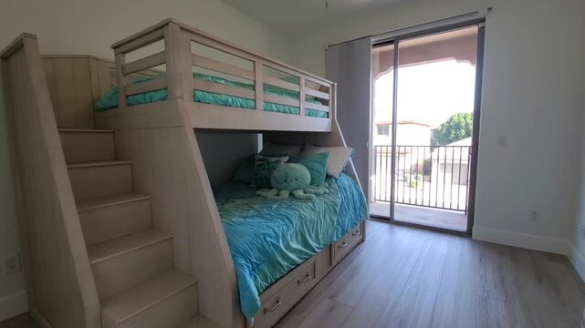 Bright Bedroom with Bunk Bed and Turquoise Bedding