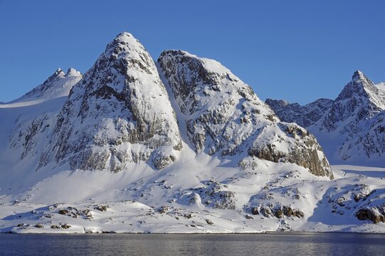 High mountains, untouched winter landscape, helicopter, Kaangamuit, Greenland, Denmark