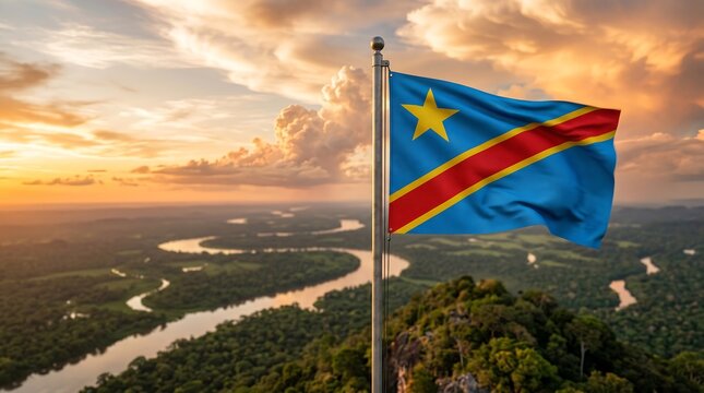 Democratic Republic of the Congo flag waving over tropical rainforest river landscape at sunset