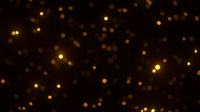Golden bokeh lights on dark background