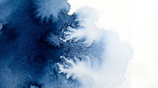 Artistic abstract watercolor wash with deep indigo blue bleeding into pure white space, creating a serene and evocative background perfect for modern minimalist design and creative art projects.