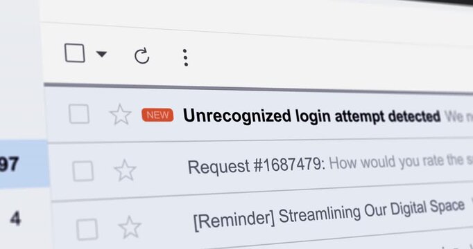 Incoming email with title Unrecognized login attempt detected, new email with security notice, close up footage