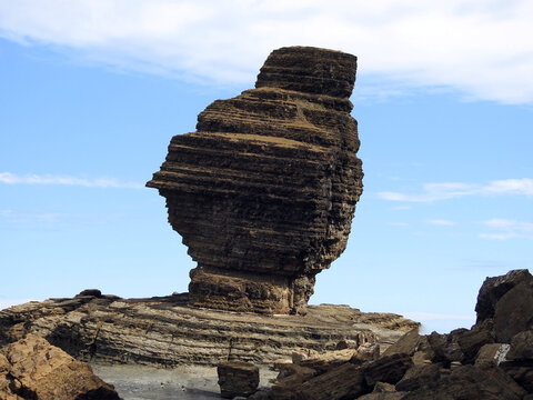 Iconic monolith "Le Bonhomme" sculpted by waves at Roche Perc&eacute;e, Bourail, New Caledonia